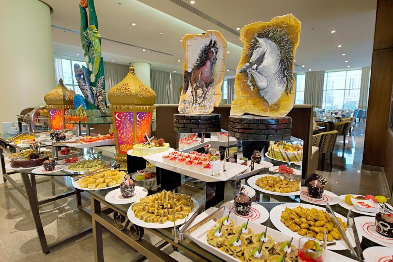 Holiday Suites Al Azizia La Mecque Extérieur photo A buffet at the Jumeirah Jumeirah Hotel