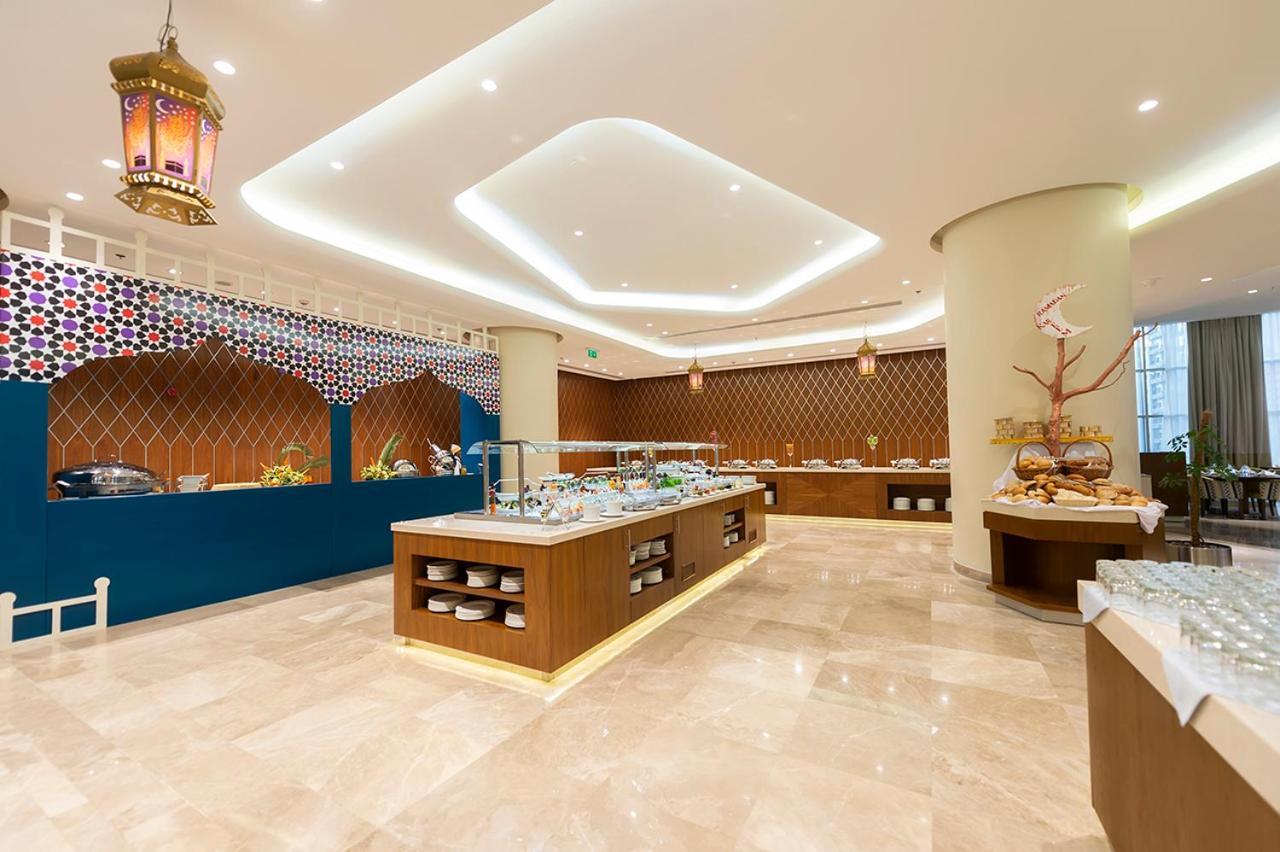 Holiday Suites Al Azizia La Mecque Extérieur photo The hotel's restaurant
