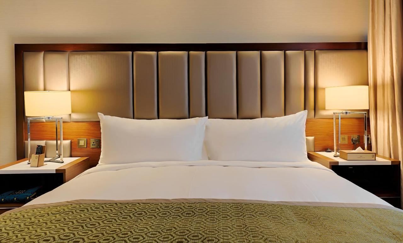 Holiday Suites Al Azizia La Mecque Extérieur photo A guest room at the hotel