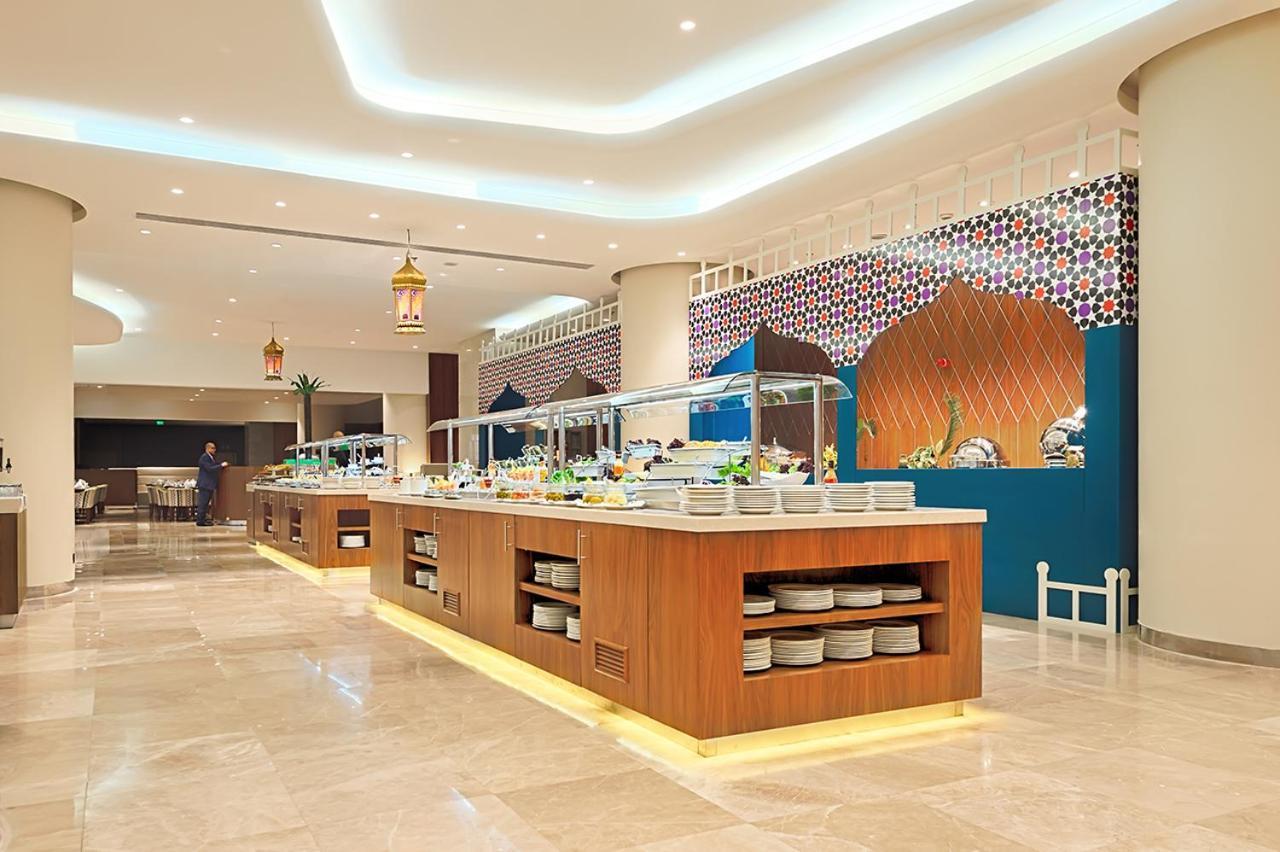 Holiday Suites Al Azizia La Mecque Extérieur photo The hotel's restaurant